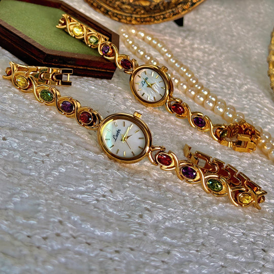 Damen Armbanduhr Oval mit Edelsteinakzenten 1