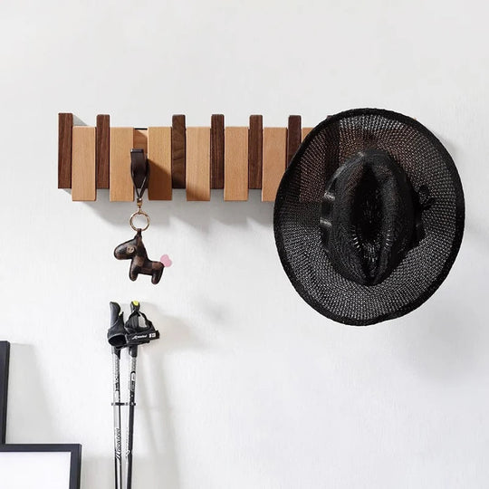 Wandgarderobe aus Holz mit klappbaren Haken 3
